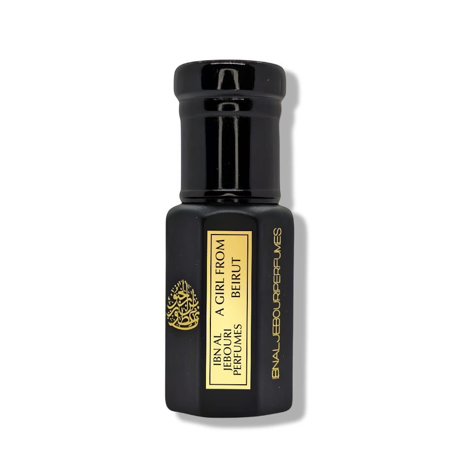 Amber glass bottle of Ibn Al Jebouri's A Girl From Beirut Pure Perfume Oil, alcohol-free, featuring rose and cedar notes.