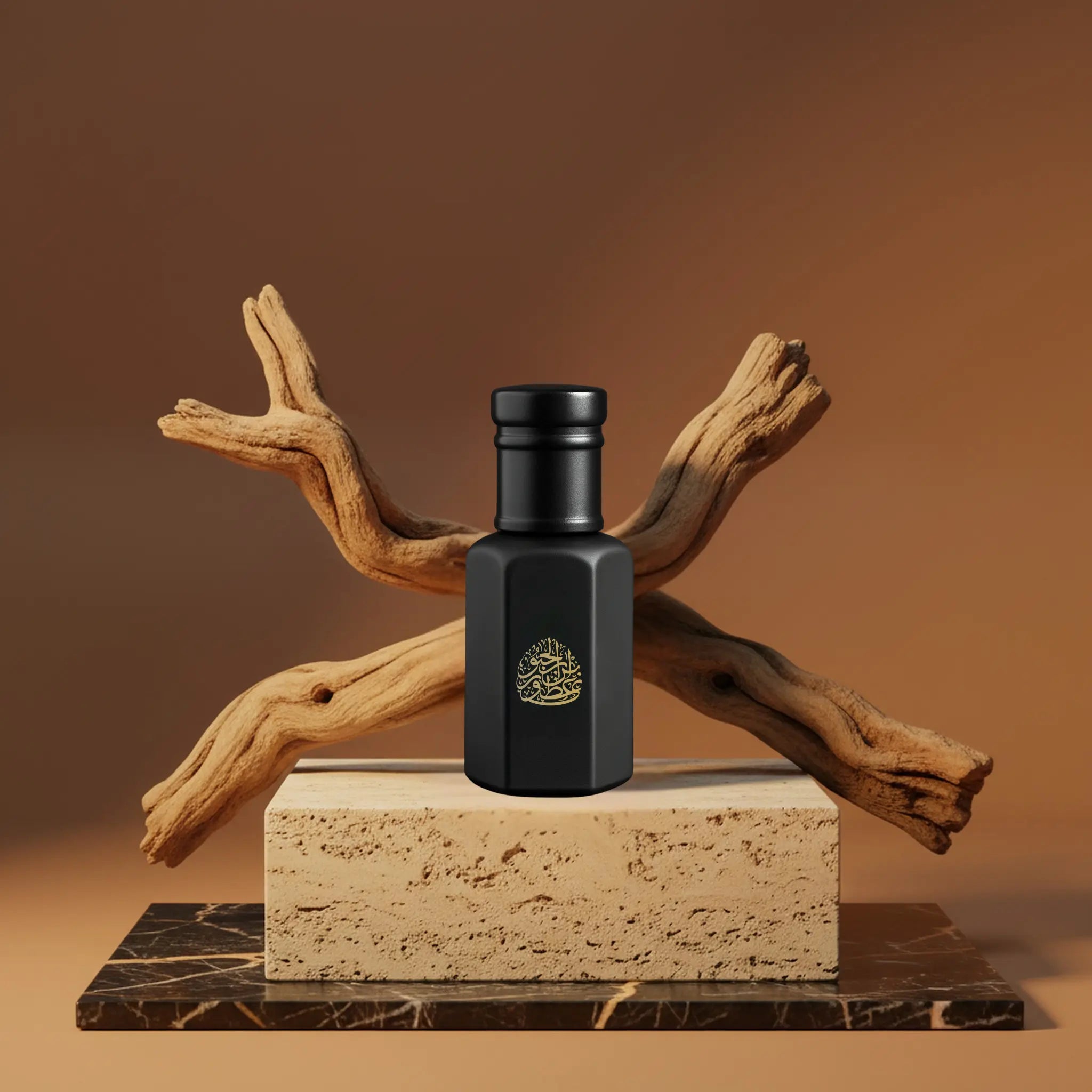 Matte black perfume bottle with ornate gold logo, displayed on a textured stone base and wooden accents.