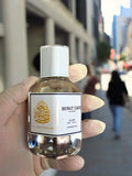 Beirut Cafe Elixir de Parfum Spray 100ml bottle showcased in an urban setting, highlighting its luxurious and handcrafted essence